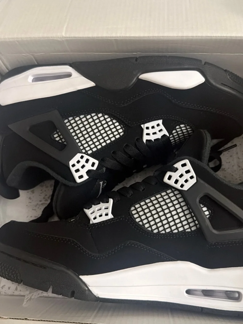 Jordan Black and White Men’s Sneakers
